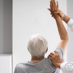 Chiropractor in Ashland, OR reassessing movement to decide how often care is needed